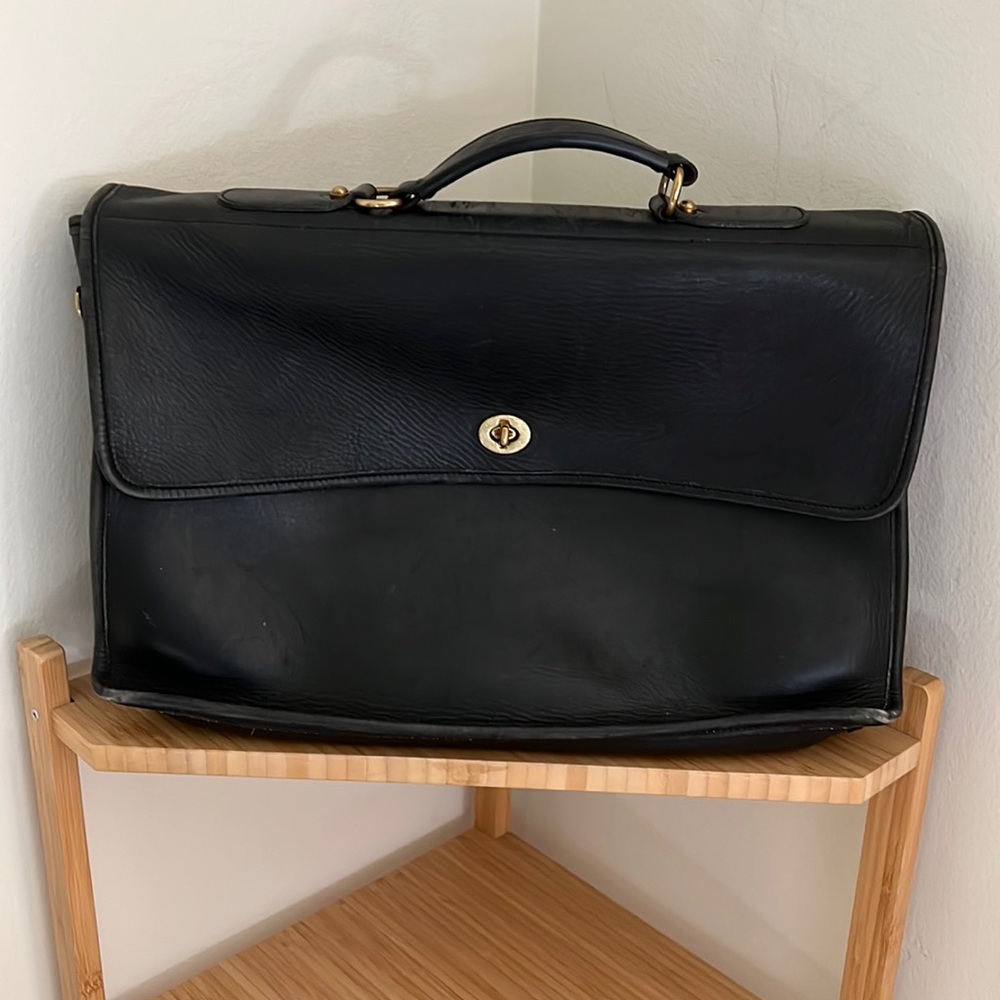 Beautiful black leather briefcase. Very high quality.